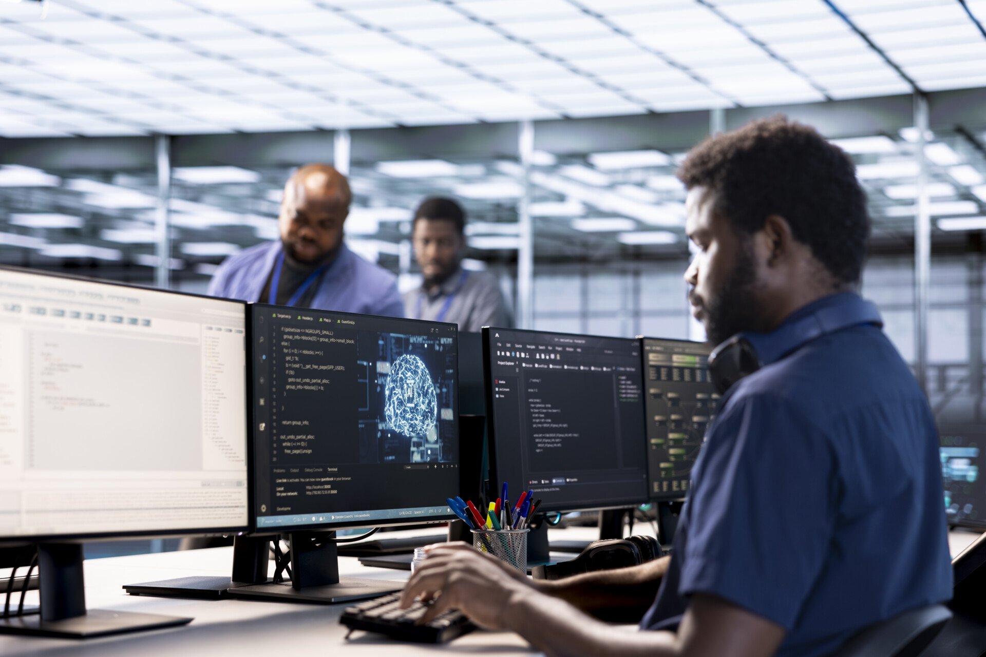 Server farm IT specialist using AI systems to input data faster